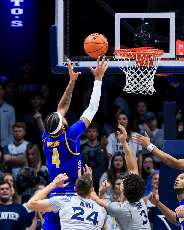 Dec 15, 2021; Cincinnati, Ohio, USA; Morehead State Eagles forward Johni Broome (4) drives to the basket against the Xavier Musketeers in the second half at the Cintas Center. Mandatory Credit: Aaron Doster-USA TODAY Sports