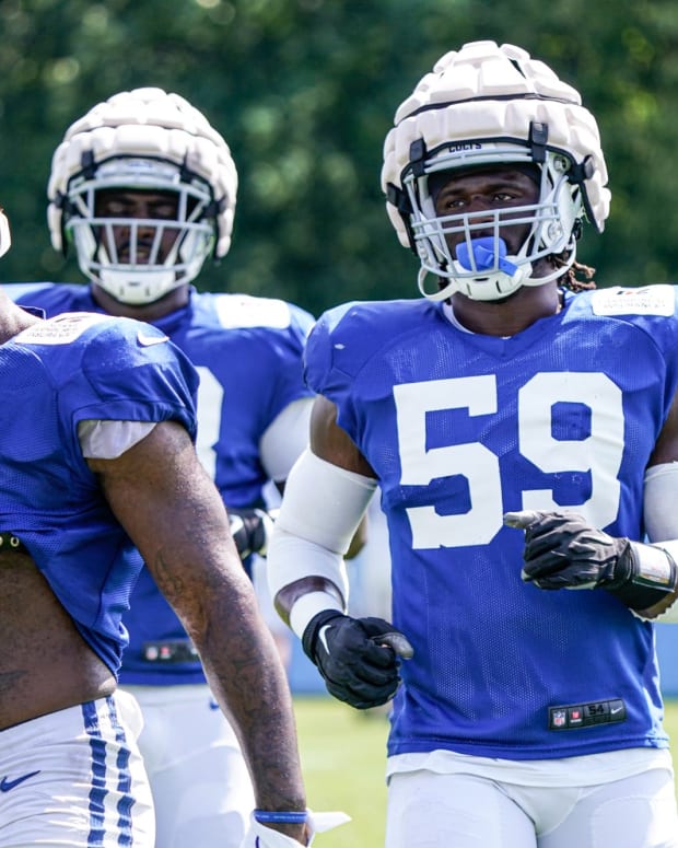 From left, The Indianapolis Colts Yannick Ngakoue (91), Eric Johnson (93), and Ifeadi Odenigbo (59) run drills during Colts Camp on Monday, August 8, 2022, at Grand Park in Westfield Ind.