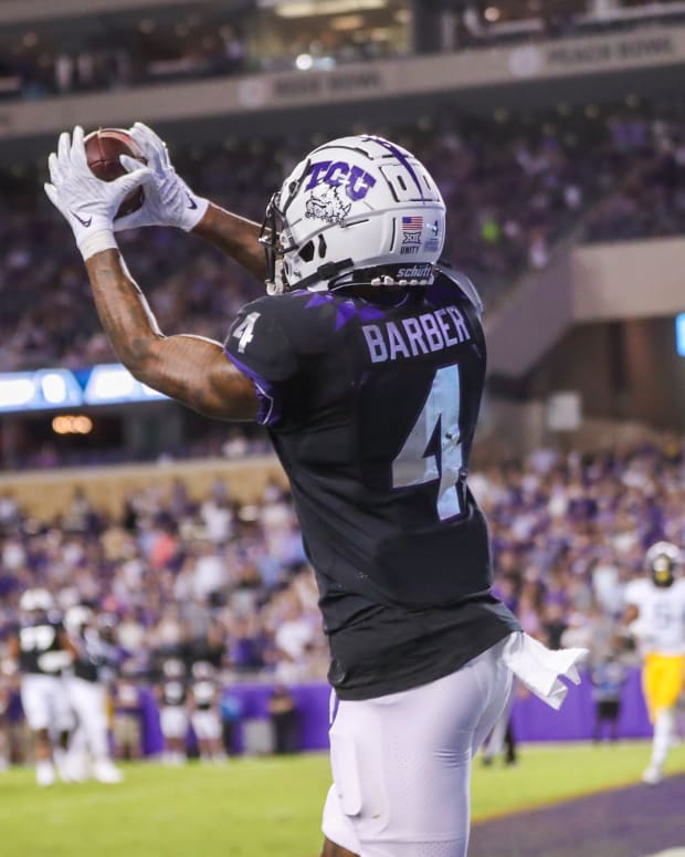 Oct 23, 2021; Fort Worth, Texas, USA; TCU Horned Frogs wide receiver Taye Barber (4) catches a pass for a touchdown during the second quarter against the West Virginia Mountaineers at Amon G. Carter Stadium.