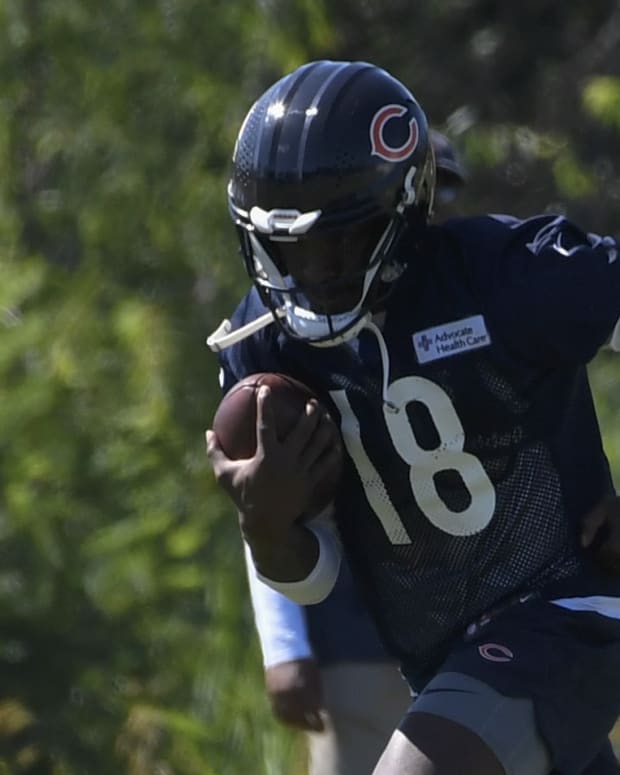David Moore hauls in a pass at training camp. The former Seahawks receiver is now among the growing list of wounded Bears receivers.