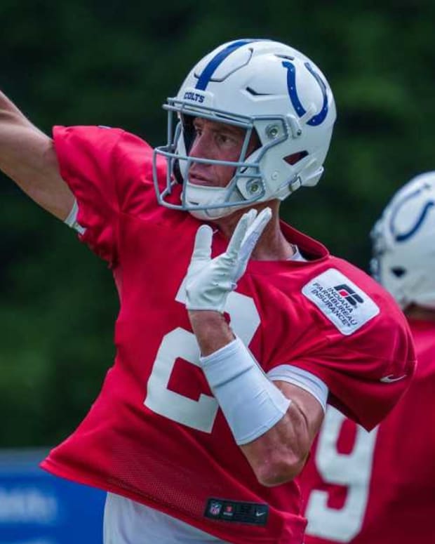 Indianapolis Colts quarterbacks Matt Ryan (2) and Nick Foles (9) drops to pass Wednesday, Aug. 10, 2022, during training camp at Grand Park Sports Campus in Westfield, Indiana.