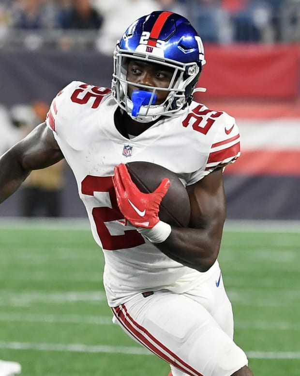 Aug 11, 2022; Foxborough, Massachusetts, USA; New York Giants running back Jashaun Corbin (25) runs after a catch during the second half of a preseason game against the New England Patriots at Gillette Stadium.