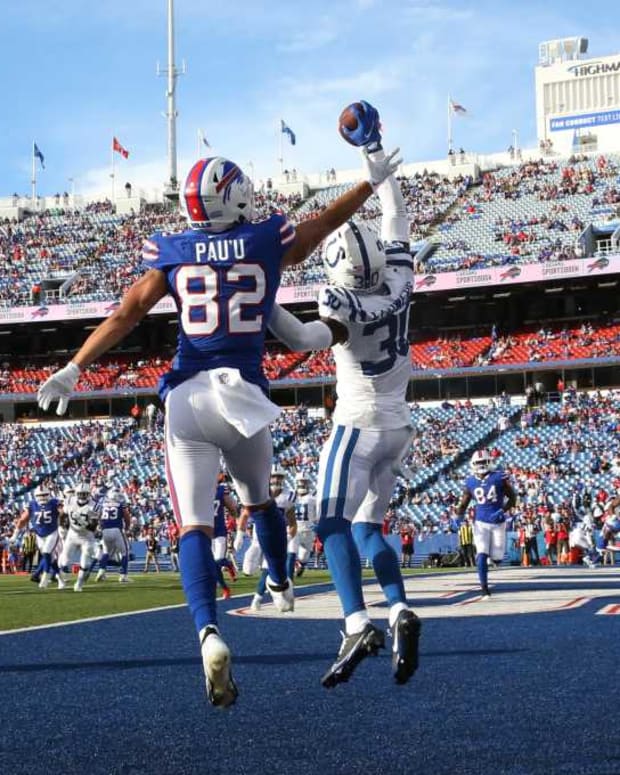 Colts Dallis Flowers (30), right, intercepts the two-point conversion pass to the Bills Neil Pau'u during the Bills 27-24 win in their first preseason game Saturday, Aug. 13, 2022 at Highmark Stadium in Orchard Park. Sd 081322 Bills 24 Spts