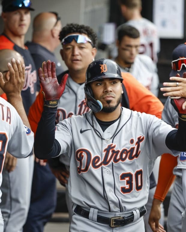 Aug 14, 2022; Chicago, Illinois, USA; Detroit Tigers first baseman Harold Castro (30) celebrates with teammates after hitting a solo home run against the Chicago White Sox during the ninth inning at Guaranteed Rate Field. Mandatory Credit: Kamil Krzaczynski-USA TODAY Sports