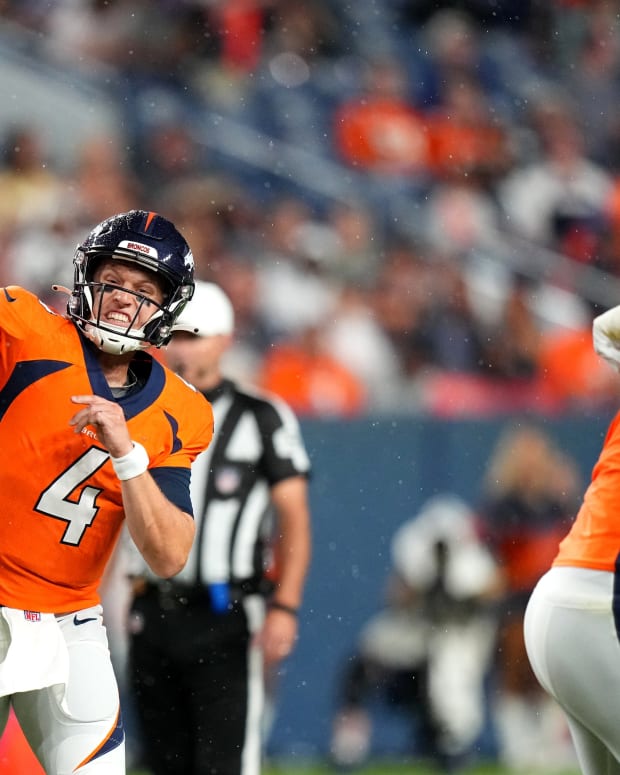 Denver Broncos quarterback Brett Rypien (4) passes the ball in the second half against the Dallas Cowboys at Empower Field at Mile High.