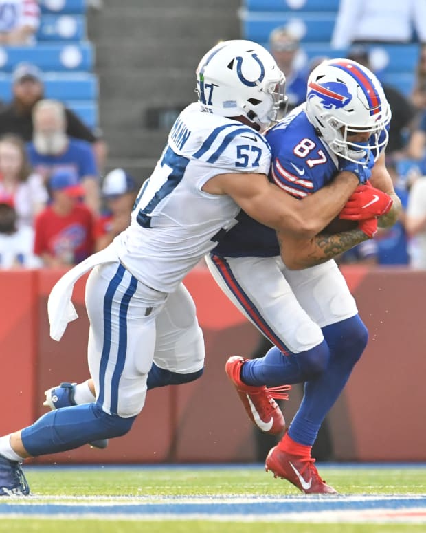 Aug 13, 2022; Orchard Park, New York, USA; Buffalo Bills wide receiver Tanner Gentry (87) is tackled by Indianapolis Colts linebacker JoJo Domann (57) after a catch in the fourth quarter pre-season game at Highmark Stadium.