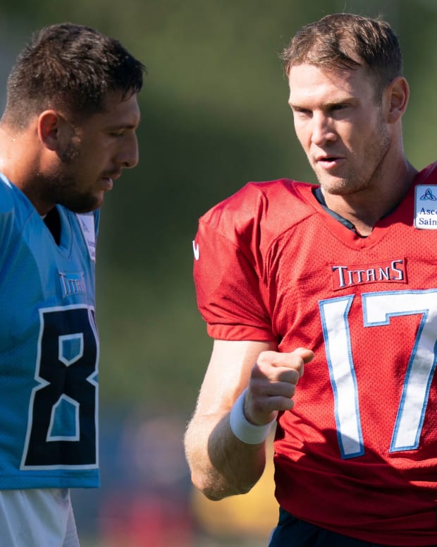 Tennessee Titans quarterback Ryan Tannehill (17) talks with tight end Austin Hooper (81) during a joint training camp practice against the Tampa Bay Buccaneers at Ascension Saint Thomas Sports Park Thursday, Aug. 18, 2022, in Nashville, Tenn.