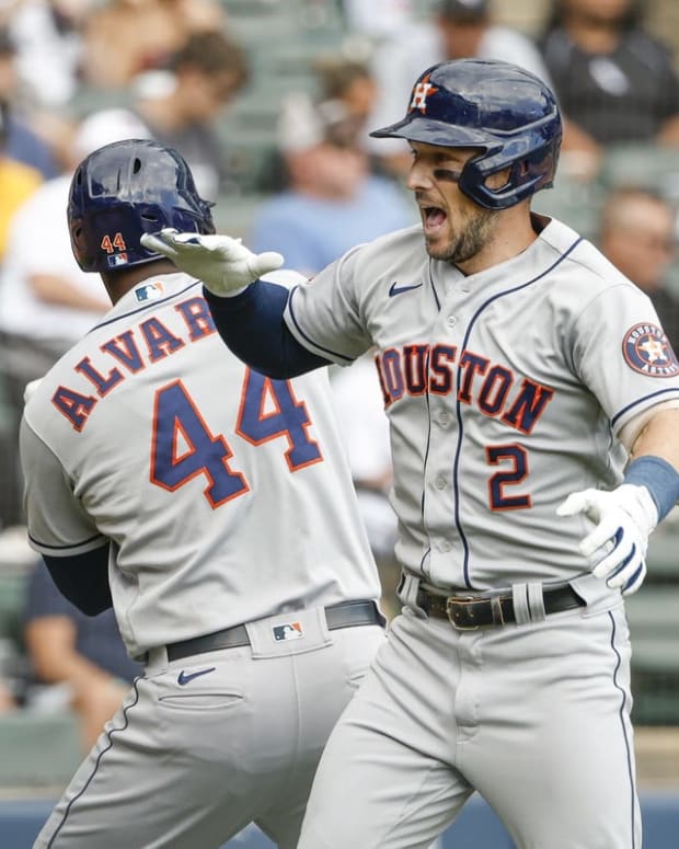 Aug 18, 2022; Chicago, Illinois, USA; Houston Astros third baseman Alex Bregman (2) celebrates with designated hitter Yordan Alvarez (44) after hitting a two-run home run against the Chicago White Sox during the fourth inning at Guaranteed Rate Field. Mandatory Credit: Kamil Krzaczynski-USA TODAY Sports