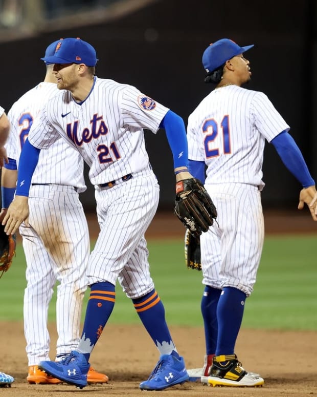 Sep 15, 2022; New York City, New York, USA; New York Mets first baseman Pete Alonso (left to right) and center fielder Brandon Nimmo and shortstop Francisco Lindor and right fielder Jeff McNeil (1) celebrate after defeating the Pittsburgh Pirates at Citi Field. All players wore number 21 in honor of Roberto Clemente Day. Mandatory Credit: Brad Penner-USA TODAY Sports