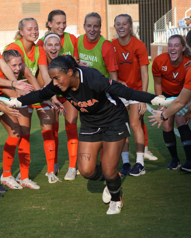 Goalkeeper Cayla White and the Virginia women's soccer team prepare for their match against North Carolina in Chapel Hill.