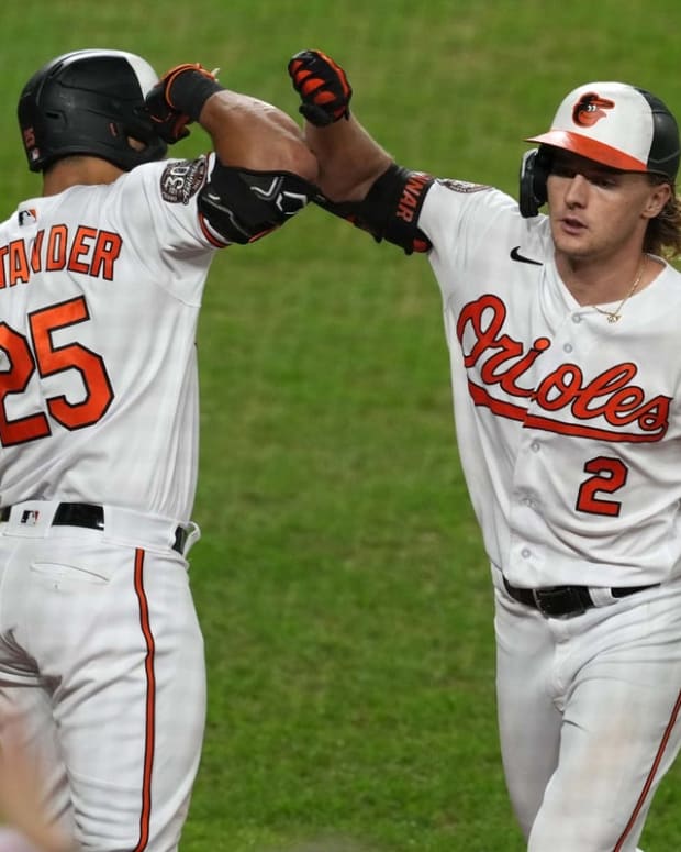 Sep 20, 2022; Baltimore, Maryland, USA; Baltimore Orioles third baseman Gunnar Henderson (2) greeted by outfielder Anthony Santander (25) after his two-run home run in the seventh inning against the Detroit Tigers at Oriole Park at Camden Yards. Mandatory Credit: Mitch Stringer-USA TODAY Sports