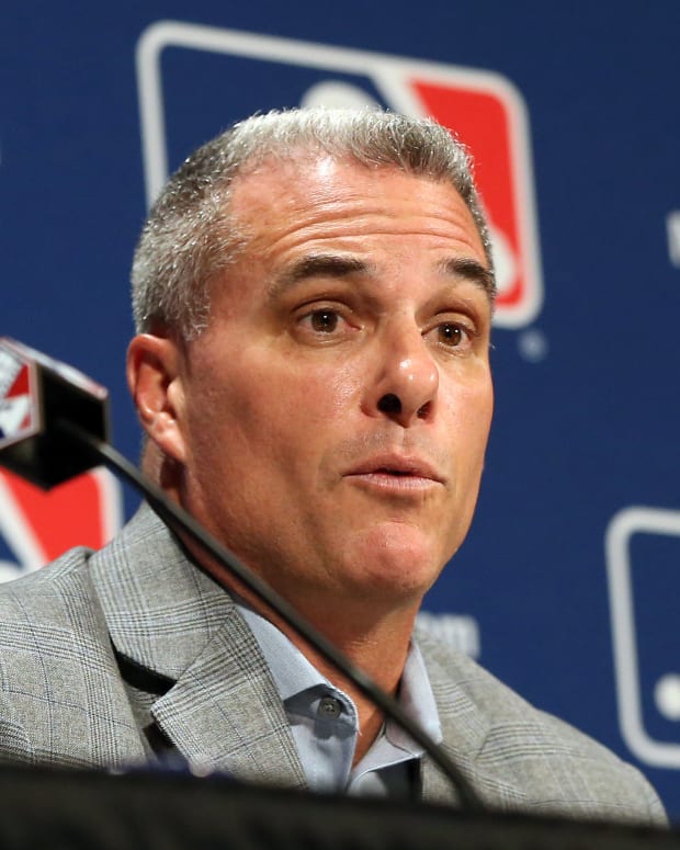 Dec 7, 2016; National Harbor, MD, USA; Kansas City Royals general manager Dayton Moore speaks with the media after announcing a trade of relief pitcher Wade Davis for outfielder Jorge Soler (both not pictured) on day three of the 2016 Baseball Winter Meetings at Gaylord National Resort & Convention Center. Mandatory Credit: Geoff Burke-USA TODAY Sports