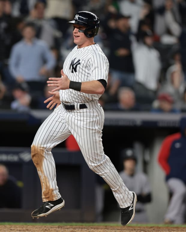 New York Yankees OF Harrison Bader scores against Boston Red Sox