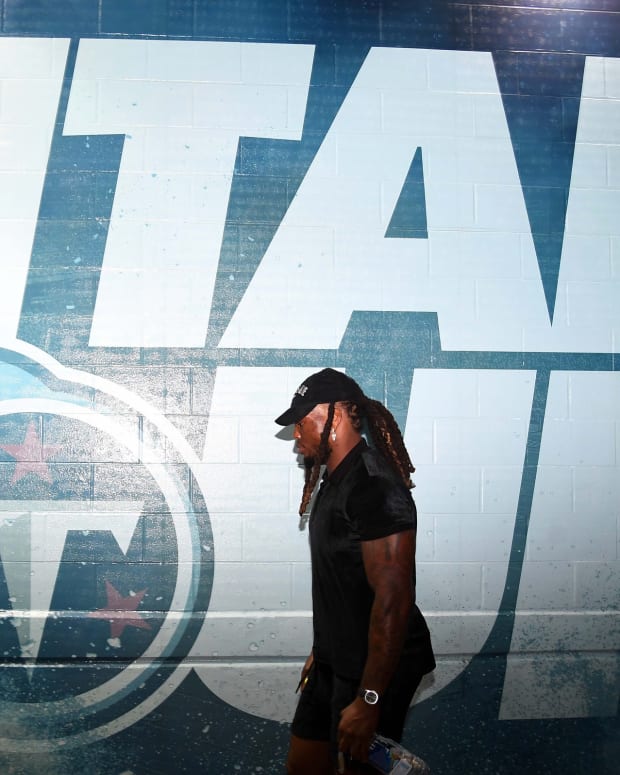 Tennessee Titans running back Derrick Henry (22) walks to the locker room before the game against the Las Vegas Raiders at Nissan Stadium.