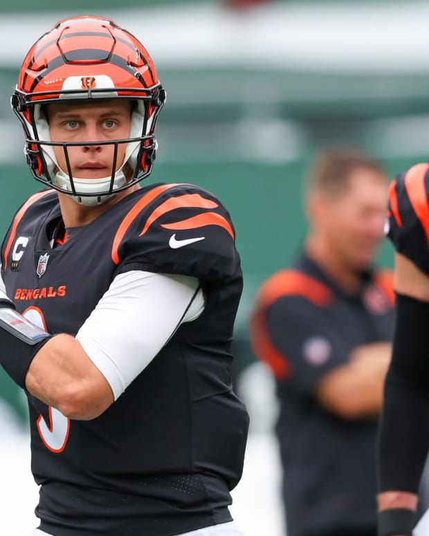Sep 25, 2022; East Rutherford, New Jersey, USA; Cincinnati Bengals quarterback Joe Burrow (9) throws a pass during warmups for their game against the New York Jets at MetLife Stadium. Mandatory Credit: Ed Mulholland-USA TODAY Sports