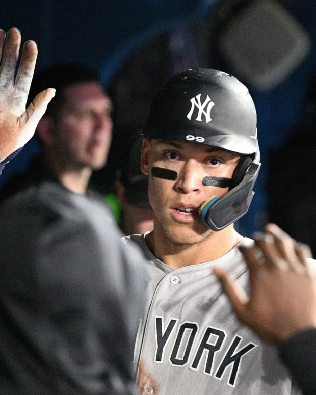 New York Yankees OF Aaron Judge celebrates in dugout