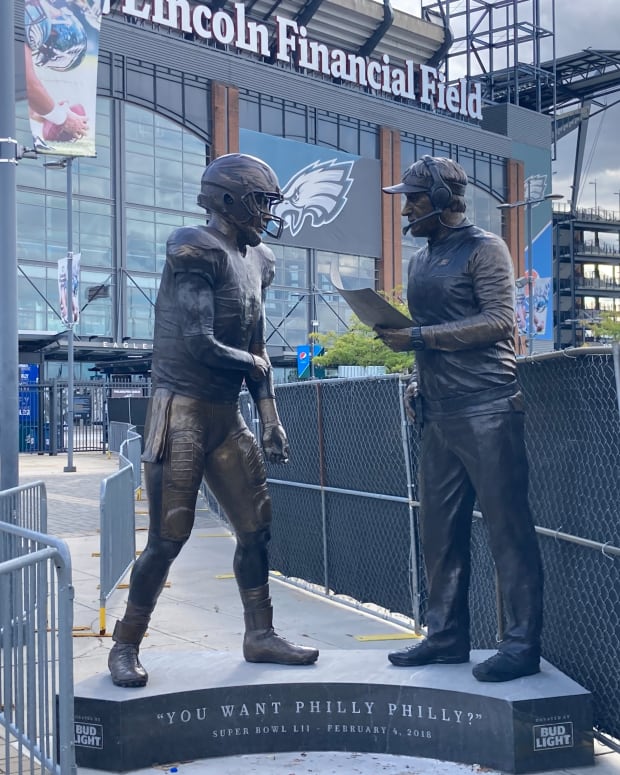 The statue immortalizing Doug Pederson and Nick Foles after Eagles Super Bowl LII triumph sits outside Lincoln Financial Field