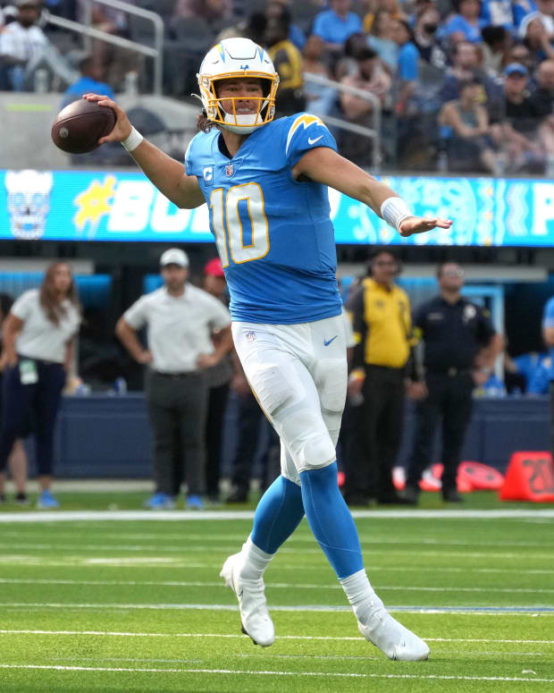 Sep 25, 2022; Inglewood, California, USA; Los Angeles Chargers quarterback Justin Herbert (10) throws the ball in the fourth quarter against the Jacksonville Jaguars at SoFi Stadium. Mandatory Credit: Kirby Lee-USA TODAY Sports