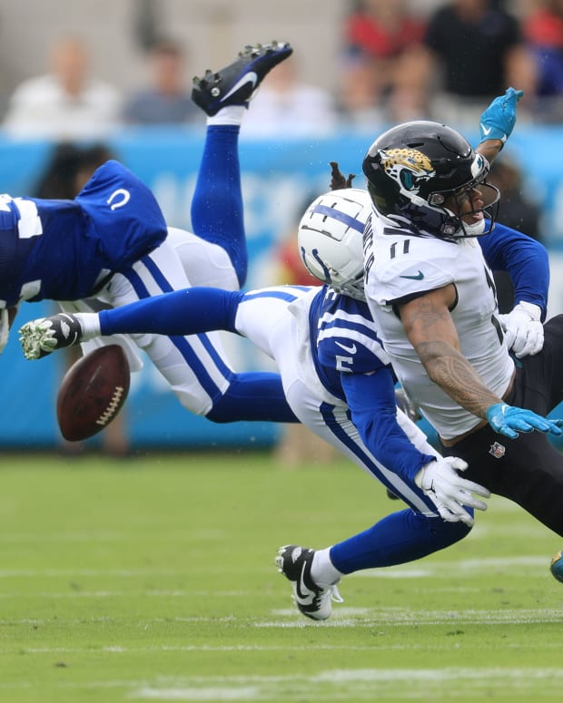 Indianapolis Colts safety Julian Blackmon (32) nearly intercepts along with cornerback Stephon Gilmore (5) against Jacksonville Jaguars wide receiver Marvin Jones Jr. (11) during the second quarter of a regular season game Sunday, Sept. 18, 2022 at TIAA Bank Field in Jacksonville.