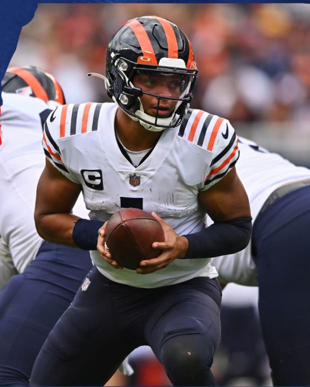 Behind Enemey Lines - Chicago Bears - Sep 25, 2022; Chicago, Illinois, USA; Chicago Bears quarterback Justin Fields (1) hands off the ball against the Houston Texans at Soldier Field. Chicago defeated Houston 23-20.