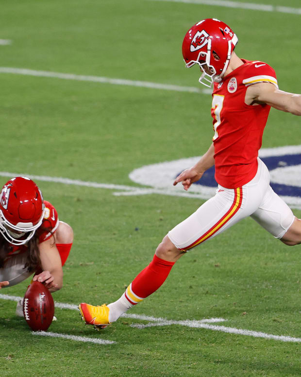 Feb 7, 2020; Tampa, FL, USA; Kansas City Chiefs kicker Harrison Butker (7) kicks a 49 yard field goal from the hold of punter Tommy Townsend (5) against the Tampa Bay Buccaneers during the first quarter of Super Bowl LV at Raymond James Stadium. Mandatory Credit: Kim Klement-USA TODAY Sports