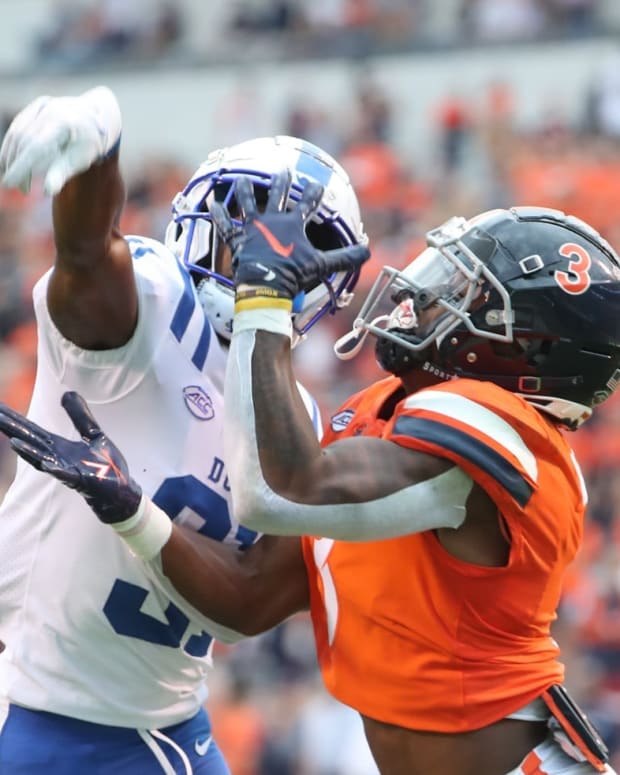 Virginia Cavaliers wide receiver Dontayvion Wicks attempts to catch a pass against the Duke Blue Devils.