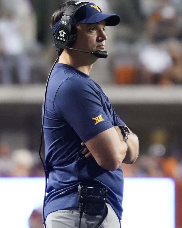 Oct 1, 2022; Austin, Texas, USA; West Virginia Mountaineers head coach Neal Brown during the second half against the Texas Longhorns at Darrell K Royal-Texas Memorial Stadium.