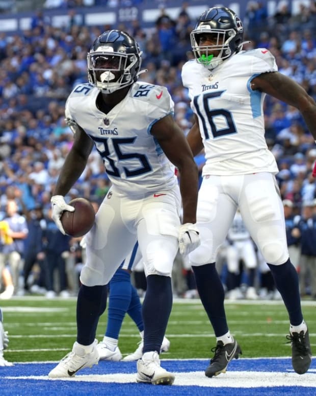 Tennessee Titans tight end Chigoziem Okonkwo (85) celebrates in the end zone after scoring a touchdown Sunday, Oct. 2, 2022, during a game against the Indianapolis Colts at Lucas Oil Stadium in Indianapolis.