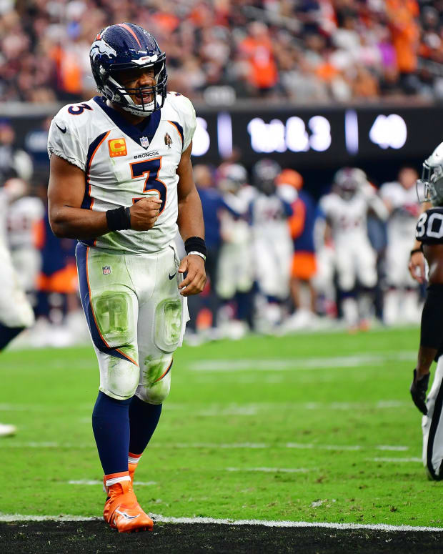 Denver Broncos quarterback Russell Wilson (3) celebrates his touchdown scored against the Las Vegas Raiders during the second half at Allegiant Stadium.