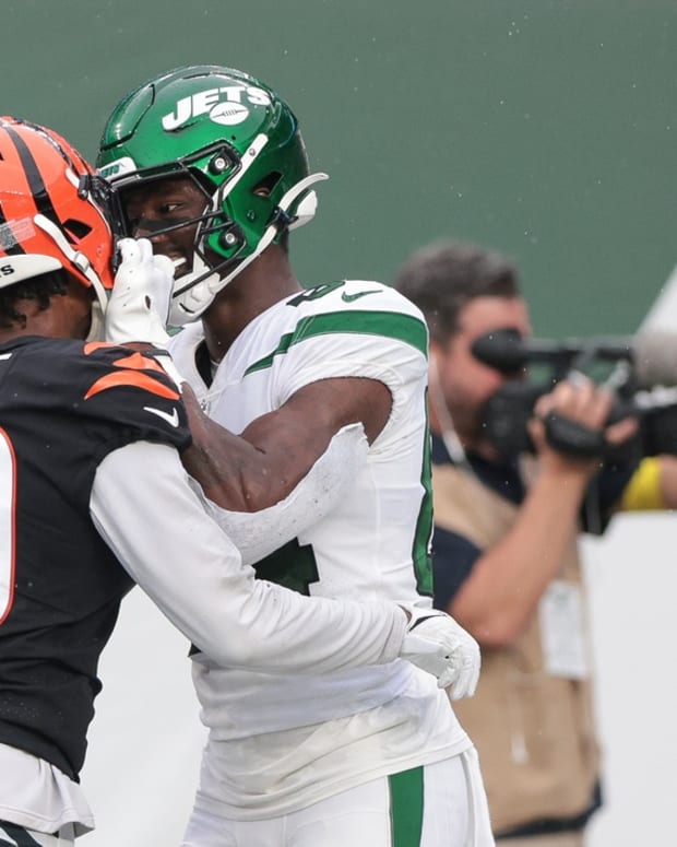 Sep 25, 2022; East Rutherford, New Jersey, USA; New York Jets wide receiver Corey Davis (84) is called for a personal foul against Cincinnati Bengals cornerback Eli Apple (20) during the second half at MetLife Stadium. Mandatory Credit: Vincent Carchietta-USA TODAY Sports