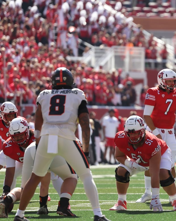 Utah Utes quarterback Cameron Rising (7) changes a play at the line scrimmage in the first quarter against the Oregon State Beavers at Rice-Eccles Stadium.