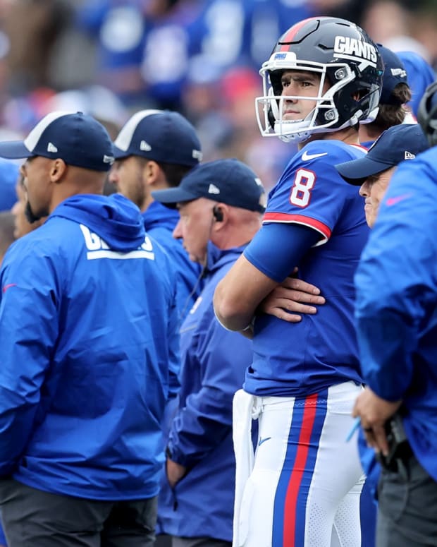 Oct 2, 2022; East Rutherford, New Jersey, USA; New York Giants quarterback Daniel Jones (8) looks on from the sideline during the fourth quarter against the Chicago Bears at MetLife Stadium.
