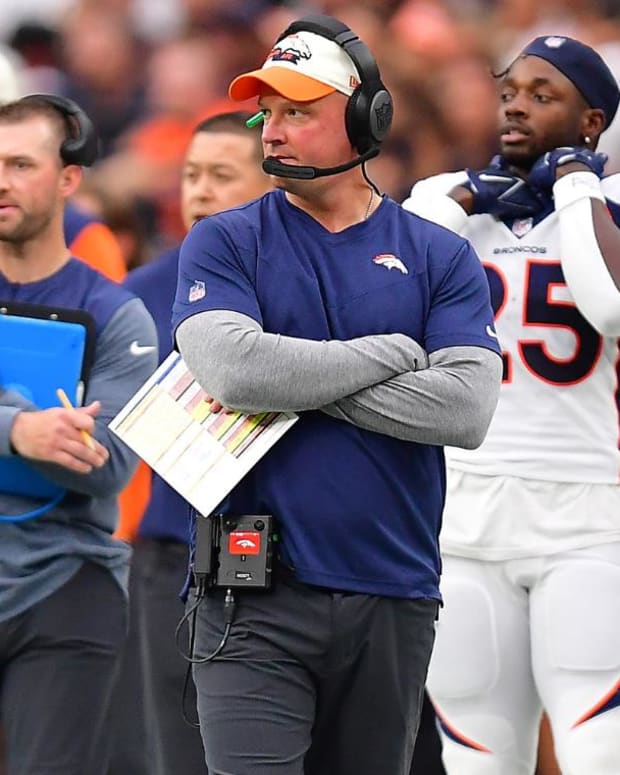 Denver Broncos head coach Nathaniel Hackett watches game action against the Las Vegas Raiders during the first half at Allegiant Stadium.
