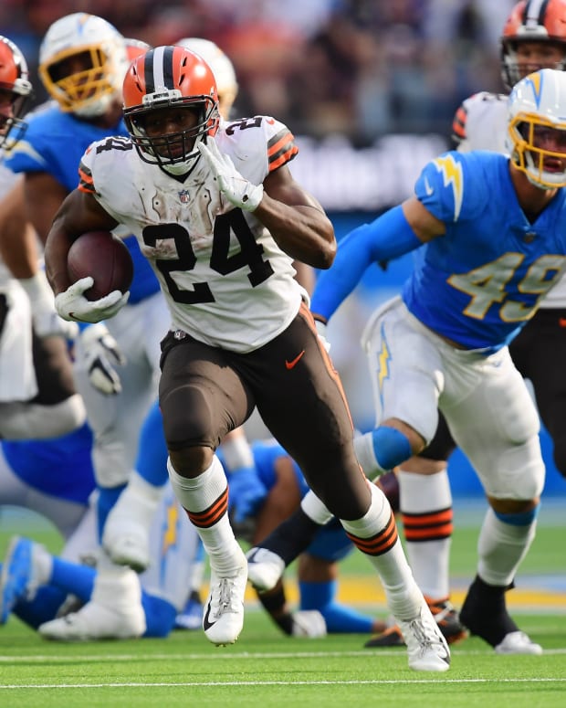 Oct 10, 2021; Inglewood, California, USA; Cleveland Browns running back Nick Chubb (24) runs the ball against the Los Angeles Chargers during the second half at SoFi Stadium. Mandatory Credit: Gary A. Vasquez-USA TODAY Sports