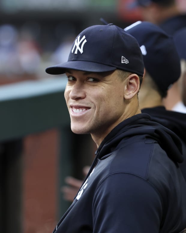 New York Yankees Aaron Judge smiles on bench