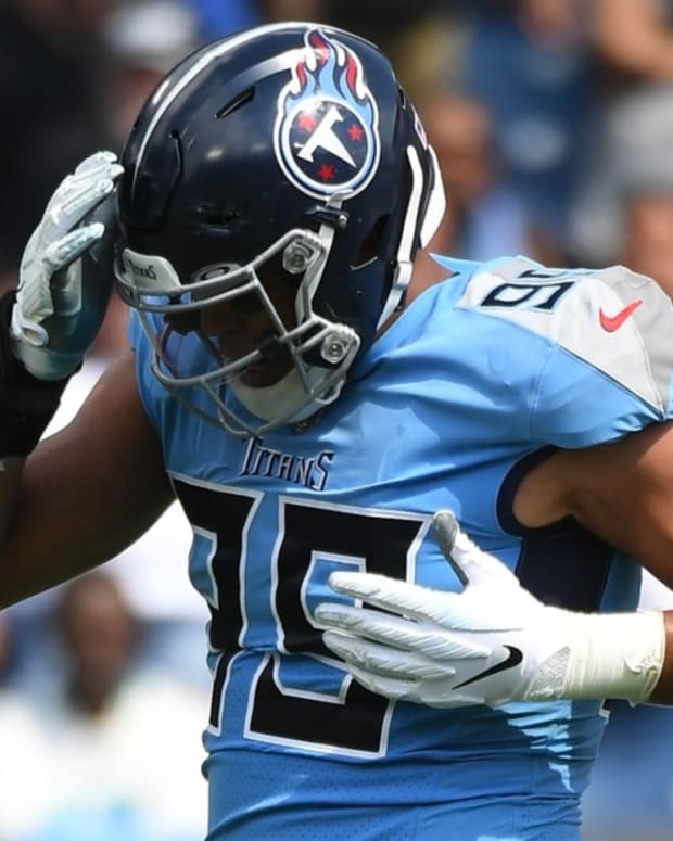 Tennessee Titans linebacker Rashad Weaver (99) celebrates after a sack during the first half against the Las Vegas Raiders at Nissan Stadium.