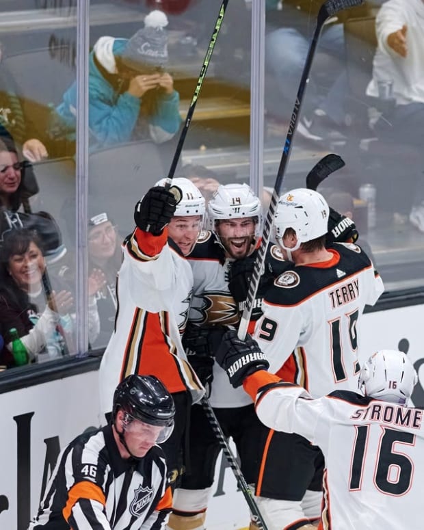 Nov 5, 2022; San Jose, California, USA; Anaheim Ducks center Adam Henrique (14) and center Trevor Zegras (11) and right wing Troy Terry (19) and center Ryan Strome (16) celebrate after Henrique scored the Ducks fourth goal against against the San Jose Sharks during the third period at SAP Center at San Jose. Mandatory Credit: Robert Edwards-USA TODAY Sports