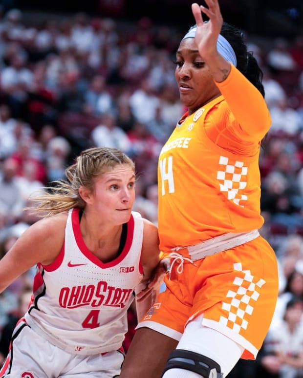 Nov 8, 2022; Columbus, OH, USA; Ohio State Buckeyes guard Jacy Sheldon (4) drives the ball around Tennessee Lady Volunteers forward Jasmine Franklin (14) during the first half of the NCAA Division I women  s basketball game at Value City Arena. Mandatory Credit: Joseph Scheller-The Columbus Dispatch

Basketball Ceb Wbk Tennessee Tennessee At Ohio State
