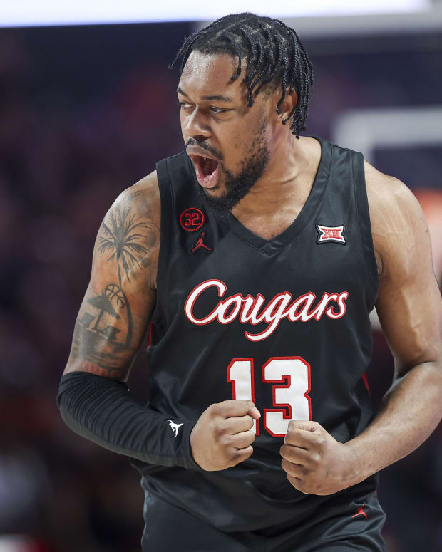 Houston Cougars forward J'Wan Roberts (13) reacts after a play during the first half against the Kansas State Wildcats at Fertitta Center.