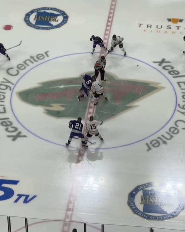 The opening faceoff of a Class A boys state hockey quarterfinal between Warroad and New Ulm at Xcel Energy Center in St. Paul, Minn., on Wednesday, March 6, 2024.