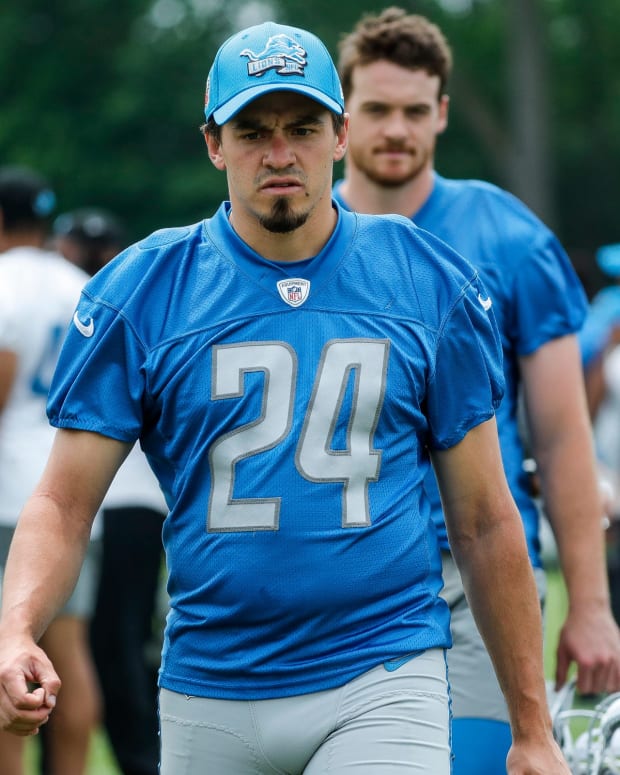 Detroit Lions place kicker John Parker Romo (24) walks off the field after practice during minicamp at Detroit Lions Headquarters and Training Facility in Allen Park on Tuesday, June 6, 2023.