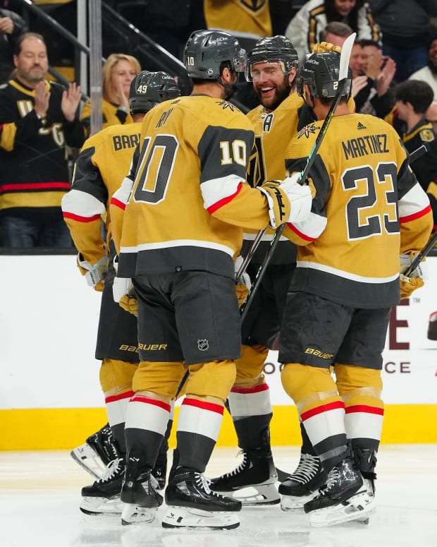 Feb 12, 2024; Las Vegas, Nevada, USA; Vegas Golden Knights right wing Jonathan Marchessault (81) celebrates with teammates after scoring a goal against the Minnesota Wild during the first period at T-Mobile Arena.