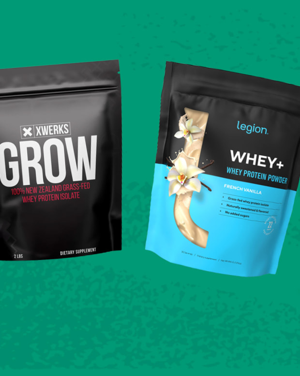 A line-up of different protein powders including, in order, Transparent Labs 100% Grass-Fed Whey Protein Isolate, XWERKS GROW 100% New Zealand Grass-Fed Whey Protein Isolate, Legion Whey+ Whey Protein Powder, and Swolverine Plant Protein Powder against a green background