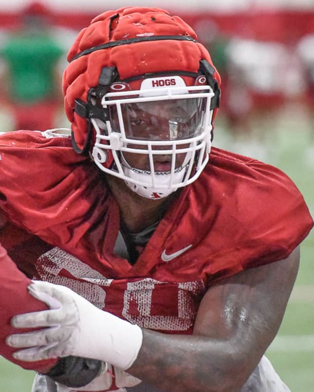 Razorbacks defensive end Eric Gregory at practice Monday afternoon indoors to beat the heat