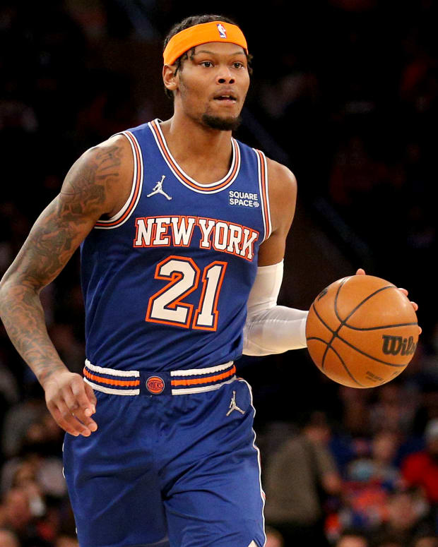 Jan 23, 2022; New York, New York, USA; New York Knicks forward Cam Reddish (21) brings the ball up court against the Los Angeles Clippers during the second quarter at Madison Square Garden.