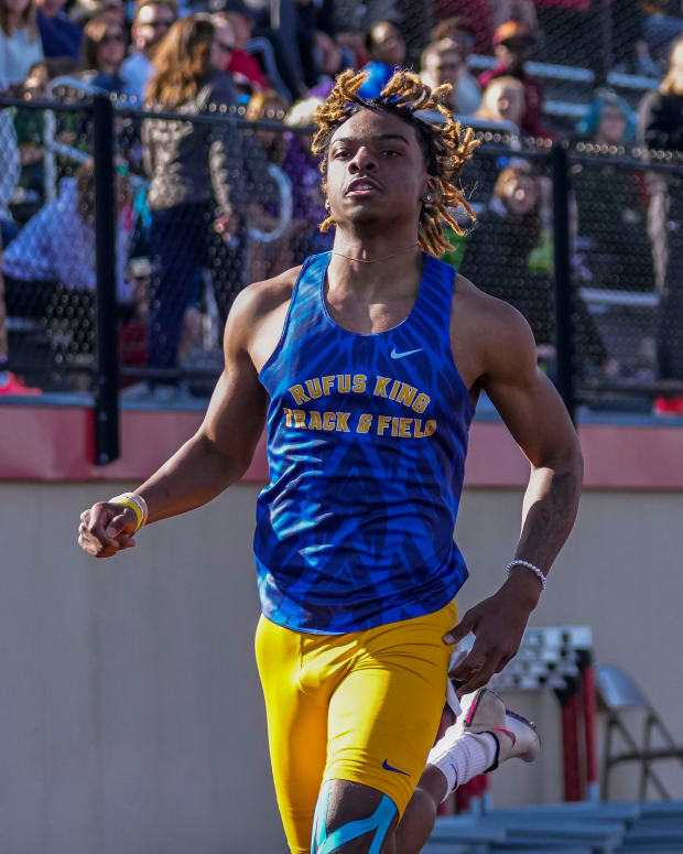 Rufus King athlete Nate White running the 100-meter dash at a track meet (Credit: Scott Ash / Now News Group / USA TODAY NETWORK)
