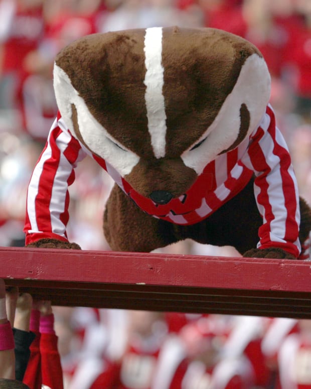 Bucky Badger doing pushups after a Wisconsin touchdown (Credit: Mary Langenfeld-USA TODAY Sports)