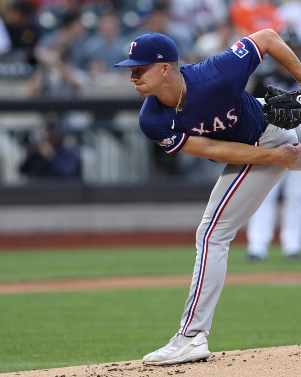 Jul 1, 2022; New York City, New York, USA; Texas Rangers starting pitcher Glenn Otto (49) delivers a pitch during the first inning against the New York Mets at Citi Field. Mandatory Credit: Vincent Carchietta-USA TODAY Sports