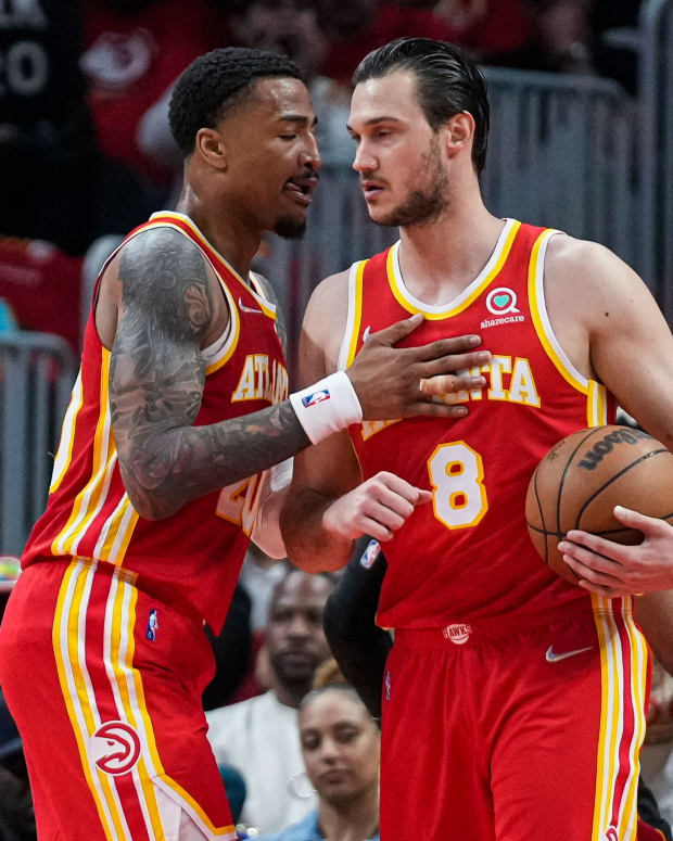 Apr 22, 2022; Atlanta, Georgia, USA; Atlanta Hawks forwards John Collins (20) and Danilo Gallinari (8) react after a basket against the Miami Heat during the first half of game three of the first round for the 2022 NBA playoffs at State Farm Arena.
