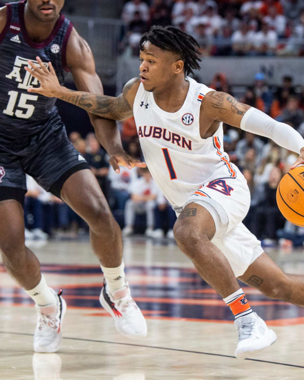 Auburn Tigers guard Wendell Green Jr. (1) drives the ball as Auburn Tigers men's basketball takes on Texas A&M Aggies at Auburn Arena in Auburn, Ala., on Saturday, Feb. 12, 2022. Auburn Tigers lead Texas A&M Aggies 33-18 at halftime.